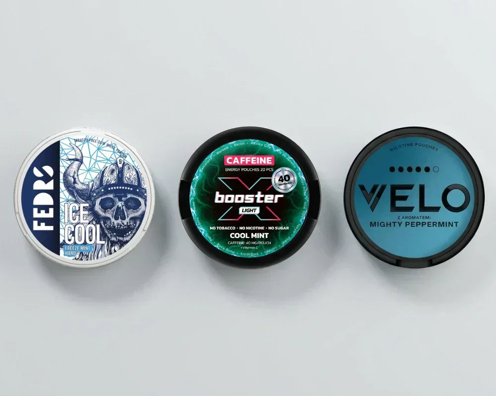 Three cans side by side: FEDRS Ice Cool, a caffeine booster Cool Mint can and VELO Mighty Peppermint