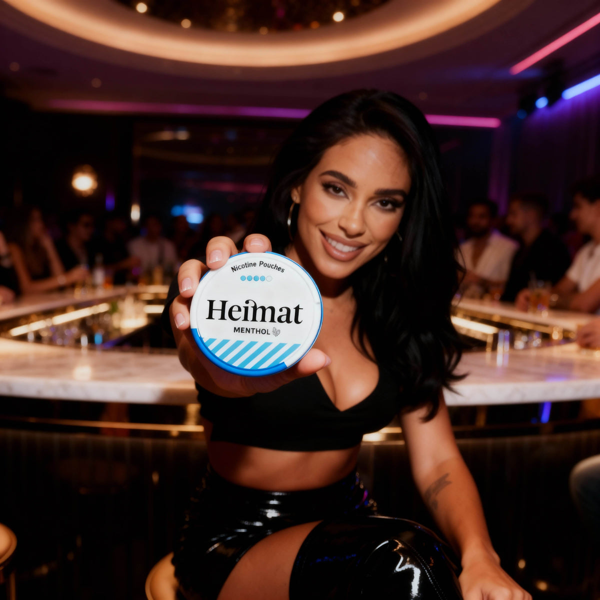 Heimat Menthol nicotine pouches, white can with blue stripe in a lifestyle setting